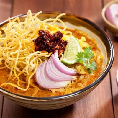 Khao Soi: Een romige curry die je smaakpapillen zal verwennen met exotische kruiden en pikante kick!